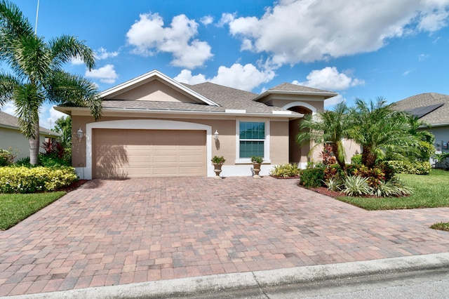 view of front of property featuring a garage