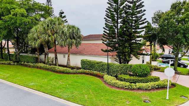 view of home's exterior featuring a lawn