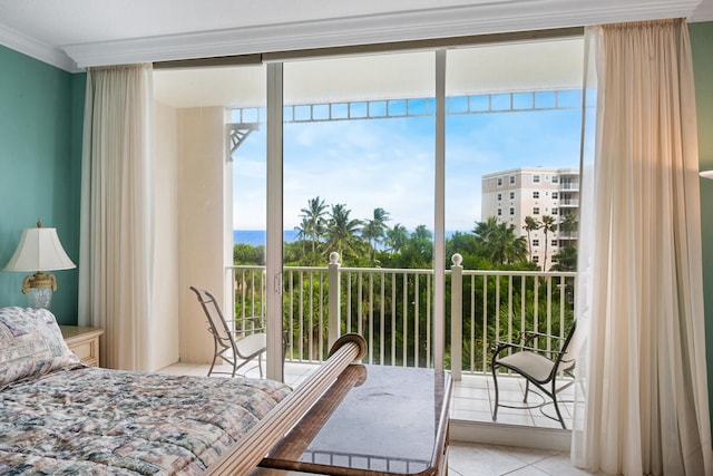 tiled bedroom with multiple windows, crown molding, and access to exterior