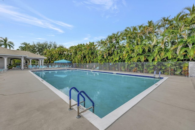 5916 Seashell Ter, Boynton Beach, FL 33437 - community pool featuring fence and a patio area