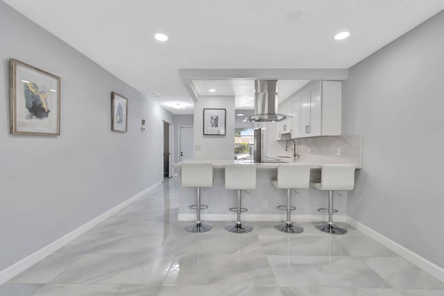 bathroom with vanity and a textured ceiling