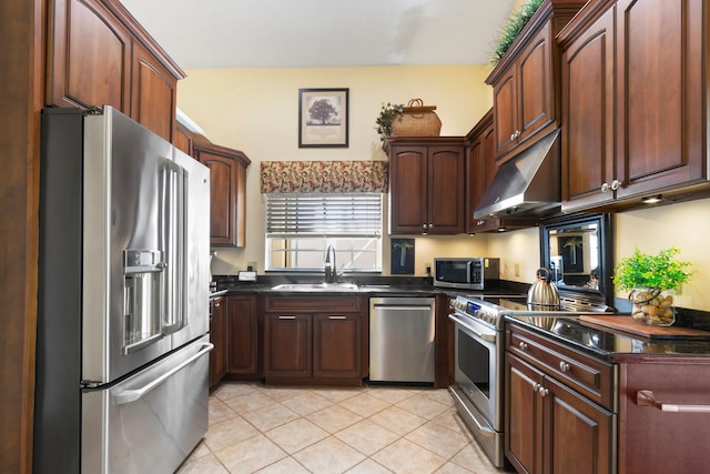 kitchen featuring sink, light tile patterned floors, and appliances with stainless steel finishes