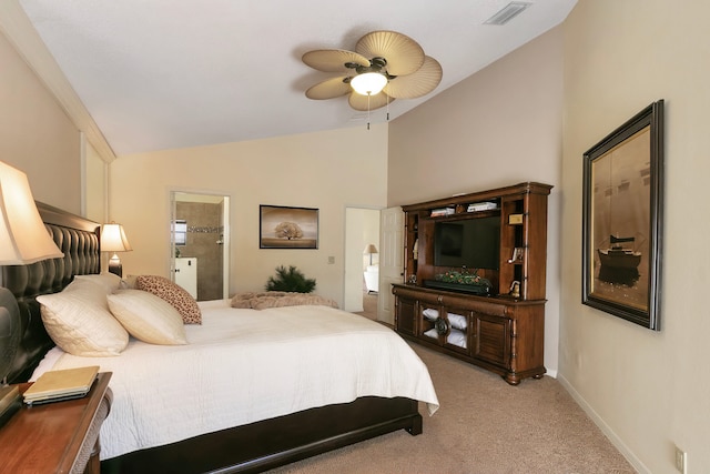 bedroom featuring carpet floors, ensuite bathroom, high vaulted ceiling, and ceiling fan