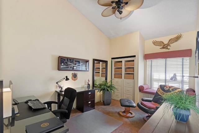 office featuring carpet flooring, ceiling fan, and high vaulted ceiling