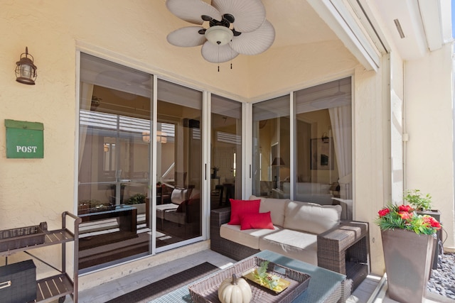 view of patio featuring ceiling fan and an outdoor hangout area