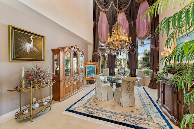 dining space featuring a notable chandelier