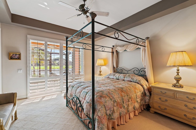 carpeted bedroom featuring ceiling fan and access to outside