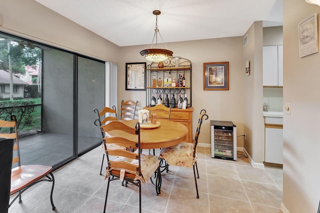 tiled dining area with beverage cooler