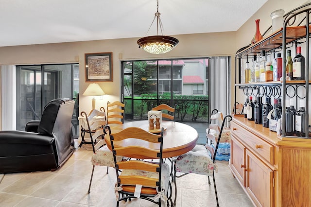 dining space with light tile patterned floors