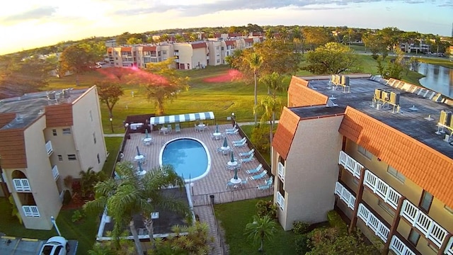 aerial view at dusk with a water view