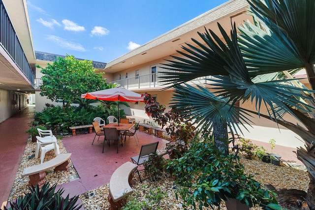 view of patio / terrace featuring a balcony