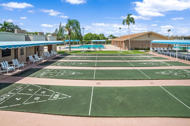 view of property's community with a pool