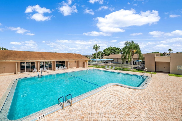 view of pool with a patio area