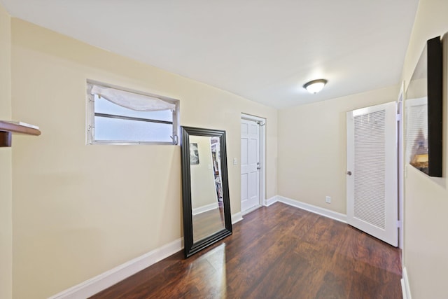 foyer featuring dark hardwood / wood-style floors