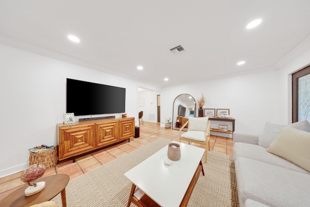 living room with light tile patterned flooring and ornamental molding