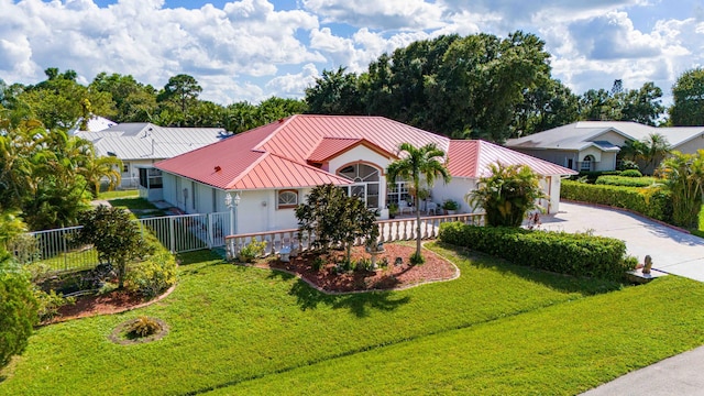 view of front of home with a front lawn