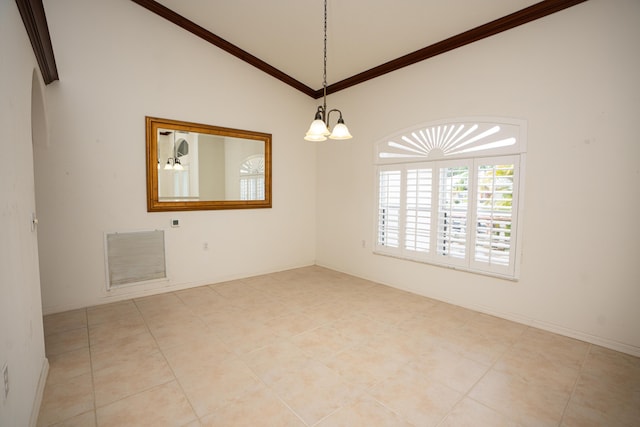 tiled empty room with a chandelier and high vaulted ceiling