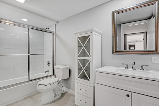 full bathroom with toilet, combined bath / shower with glass door, and vanity