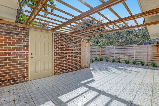 view of patio featuring a pergola