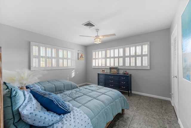 bedroom with a closet and ceiling fan