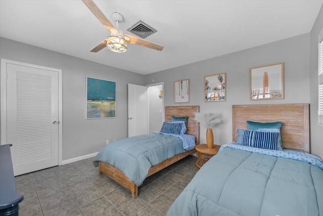 bedroom with a closet and ceiling fan