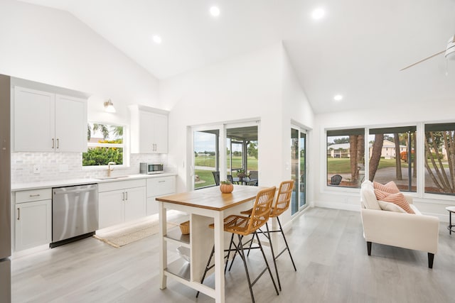 kitchen with white cabinetry, sink, plenty of natural light, and appliances with stainless steel finishes