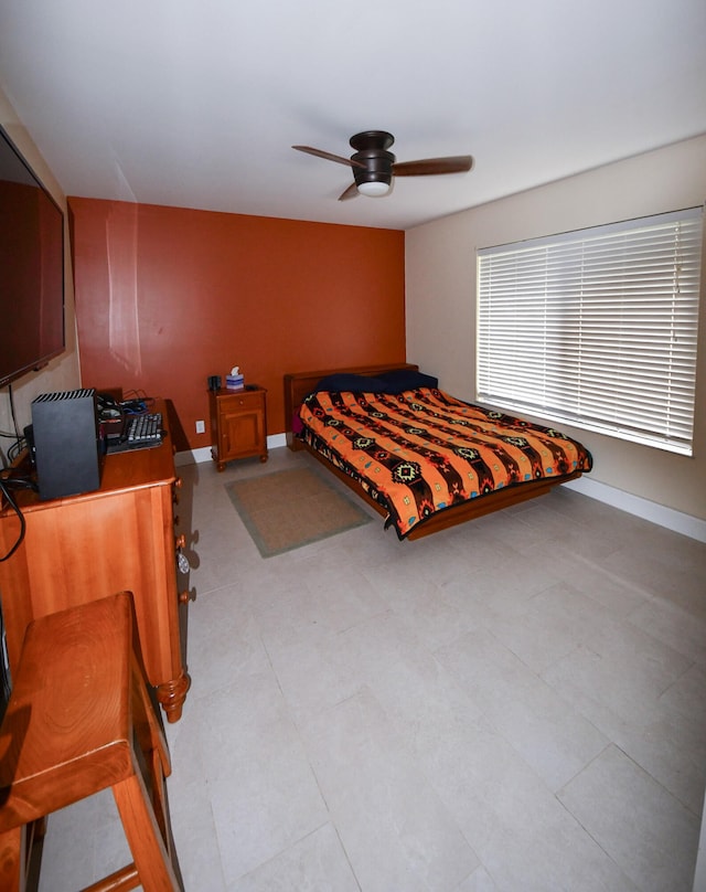 bedroom featuring ceiling fan