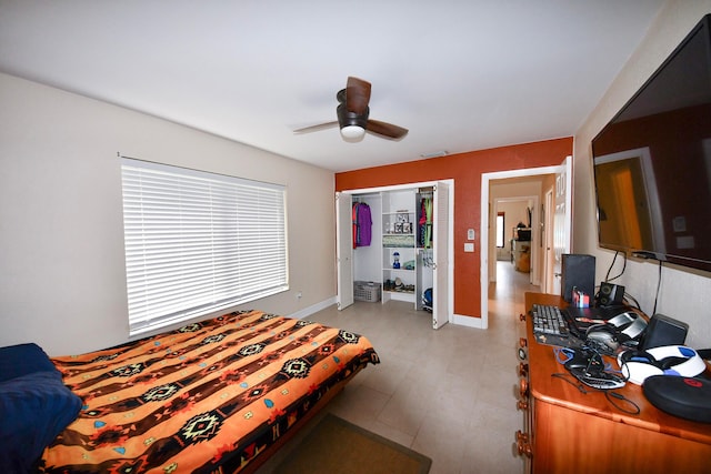 bedroom with a closet and ceiling fan