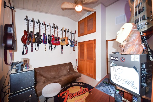 interior space featuring ceiling fan, vaulted ceiling, and wooden ceiling