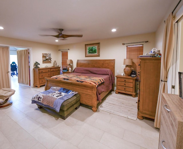 bedroom featuring light tile patterned flooring and ceiling fan