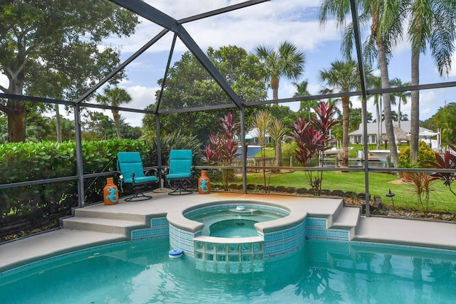 view of swimming pool featuring an in ground hot tub, glass enclosure, a lawn, and a patio area