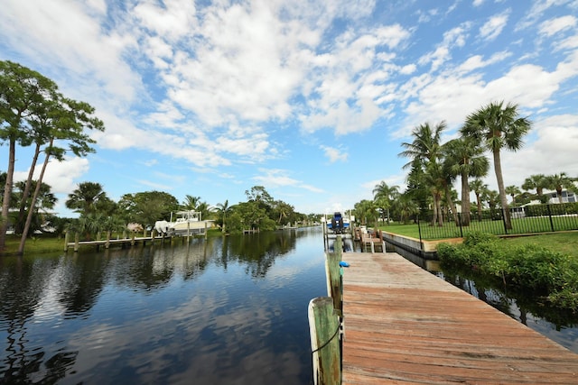 dock area featuring a water view