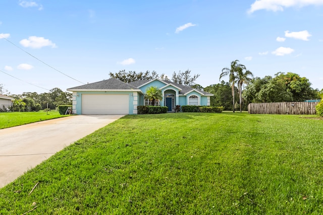 ranch-style house featuring a garage and a front lawn