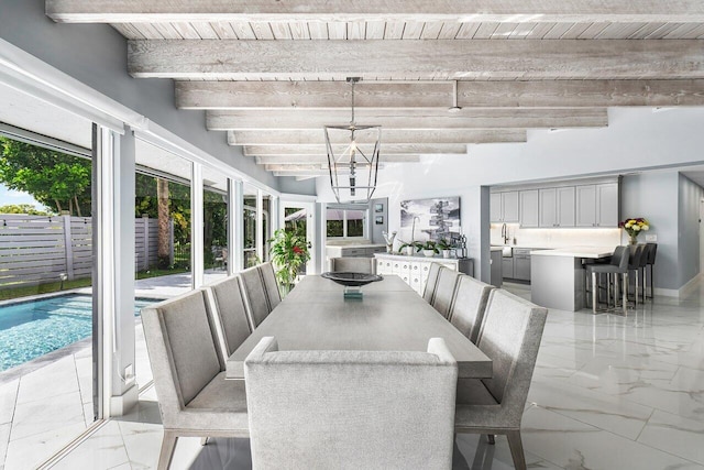 dining area featuring wooden ceiling, beam ceiling, and an inviting chandelier