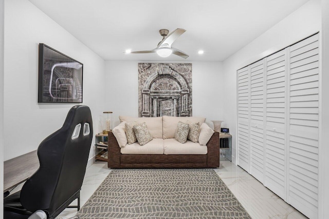 living room with ceiling fan