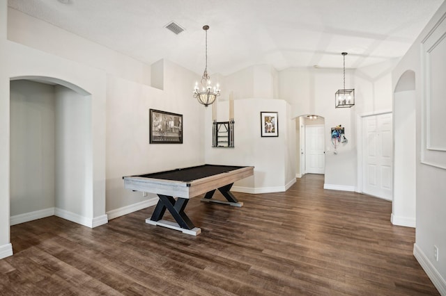 dining area with dark hardwood / wood-style flooring, lofted ceiling, and pool table