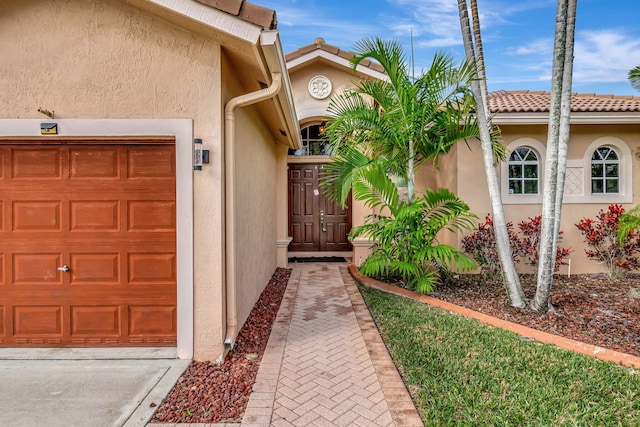 property entrance featuring a garage