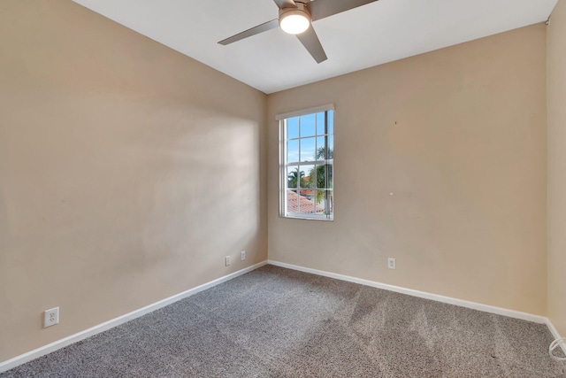 carpeted empty room with ceiling fan