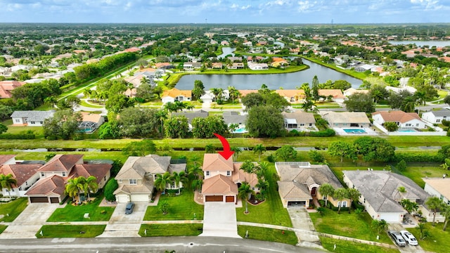 drone / aerial view with a water view