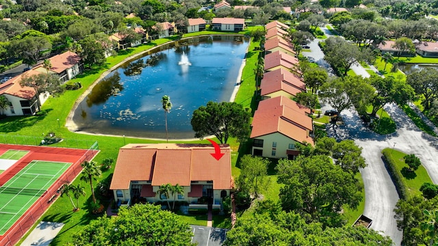 drone / aerial view featuring a water view