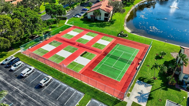 bird's eye view with a water view