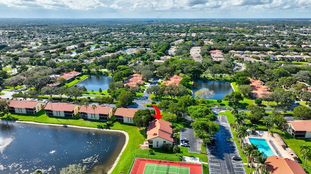 birds eye view of property featuring a water view