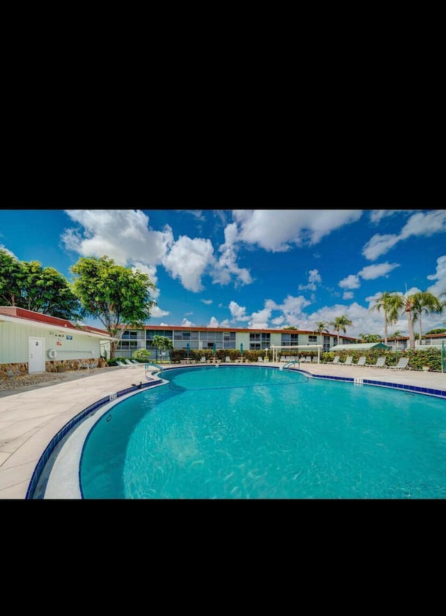 view of pool with a patio area