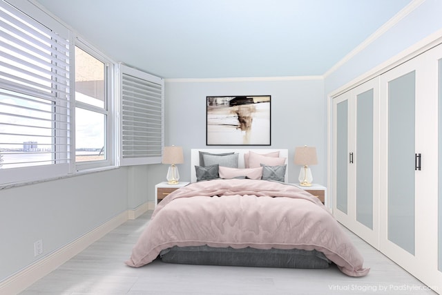 bedroom with crown molding