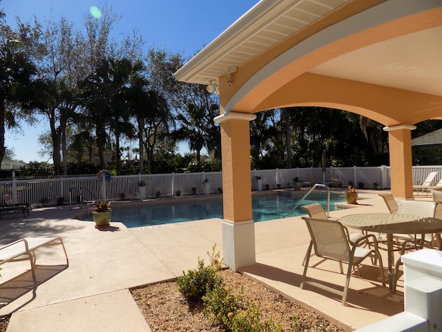 view of pool featuring a patio area