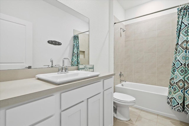 full bathroom featuring vanity, shower / bath combo, toilet, and tile patterned floors