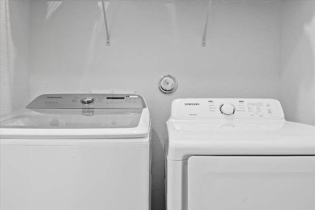 laundry area featuring separate washer and dryer