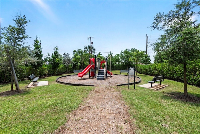 view of playground featuring a lawn