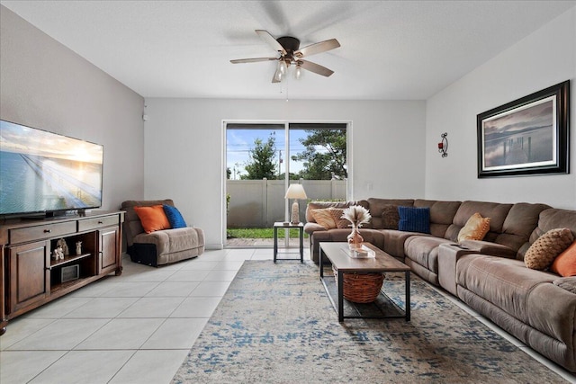 living room with light tile patterned floors and ceiling fan