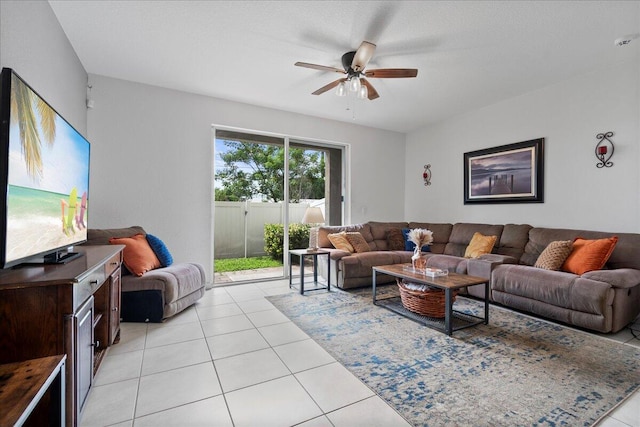 living room with light tile patterned flooring and ceiling fan